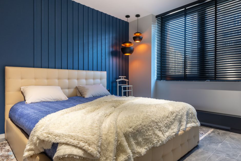 Elegant bedroom blackout roller shades and drapes