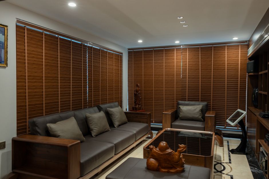 Modern living room with elegant custom window blinds